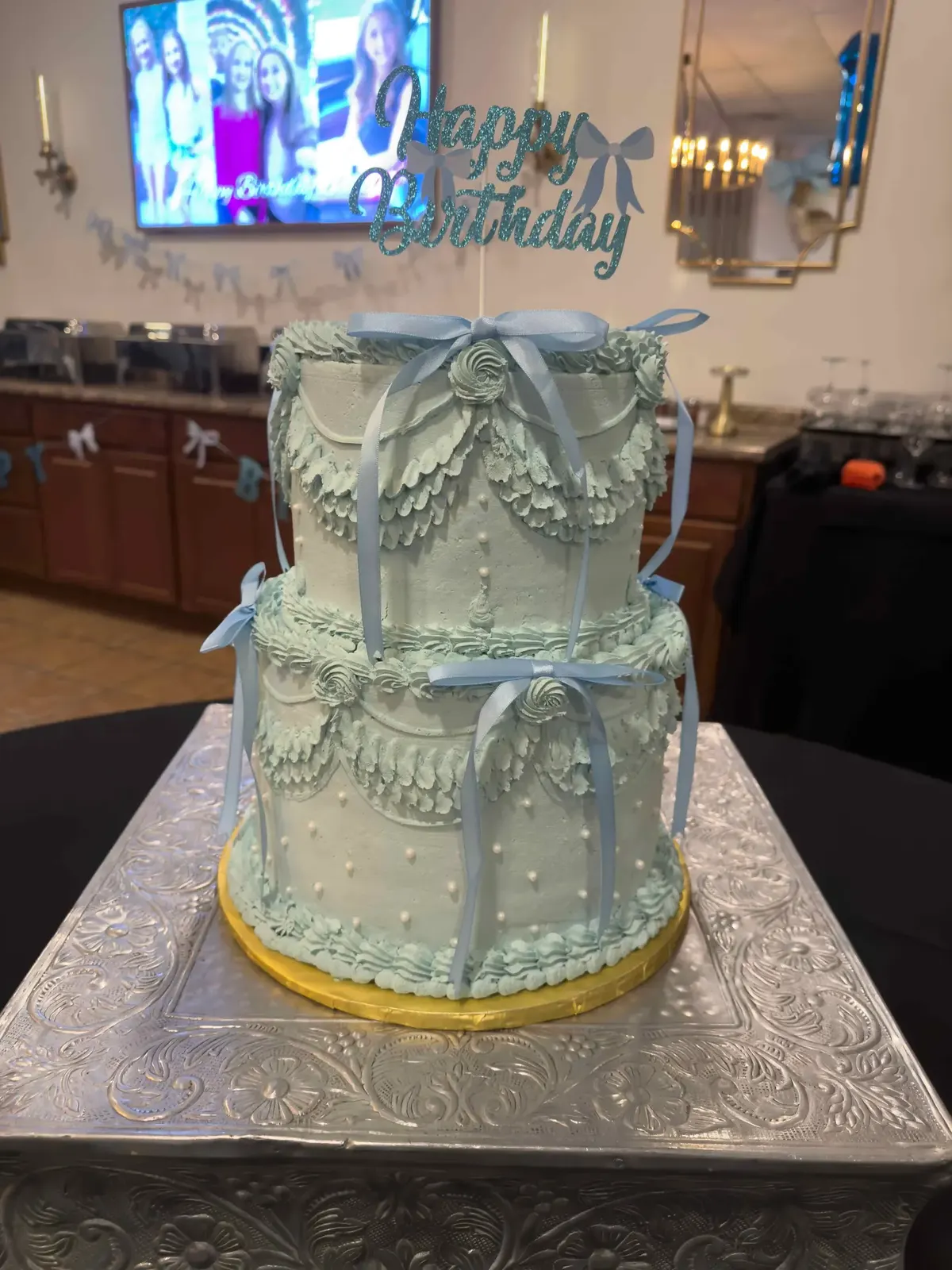 Tiered custom cake finished in buttercream by Joe's Bakery